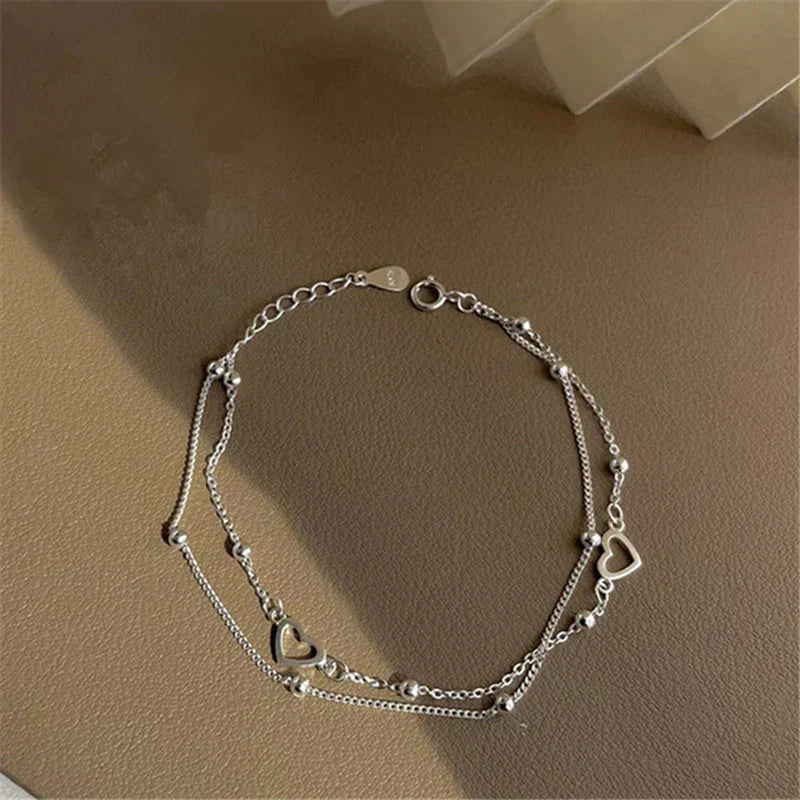 Pulsera ajustable con corazón en plata